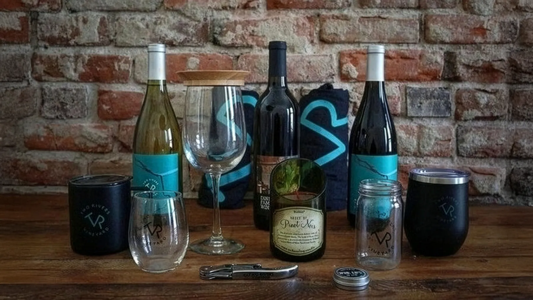 Two Rivers wine bottles and glasses
